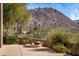 Outdoor fire pit and patio with scenic mountain backdrop at 10040 E Happy Valley Rd # 2046, Scottsdale, AZ 85255