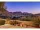 Fire pit and patio area with breathtaking mountain views at 10040 E Happy Valley Rd # 2046, Scottsdale, AZ 85255