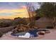 Serene pool at sunset with mountain views at 10040 E Happy Valley Rd # 2046, Scottsdale, AZ 85255