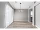 Spacious dining area featuring hardwood floors and a chandelier at 10931 W Ruth Ave, Peoria, AZ 85345