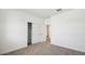 Bright bedroom with double door closet and neutral carpeting at 12421 E Bahia Ct, Florence, AZ 85132