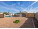 The property boasts a refreshing pool and a spacious backyard at 12820 N 29Th Dr, Phoenix, AZ 85029