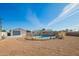 Large backyard with gravel, a pool, and detached garage at 12820 N 29Th Dr, Phoenix, AZ 85029