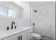 Clean bathroom with marble shower and modern vanity at 12820 N 29Th Dr, Phoenix, AZ 85029