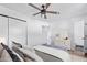 Bedroom with ceiling fan and private bathroom access at 12820 N 29Th Dr, Phoenix, AZ 85029