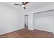 Bright bedroom with wood floors, and access to bathroom at 12820 N 29Th Dr, Phoenix, AZ 85029