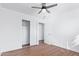 Well-lit bedroom, offering wood floors and ample closet space at 12820 N 29Th Dr, Phoenix, AZ 85029