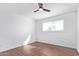 Charming bedroom with wood floors and a ceiling fan at 12820 N 29Th Dr, Phoenix, AZ 85029