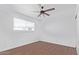 Bright bedroom with ceiling fan and hardwood floors at 12820 N 29Th Dr, Phoenix, AZ 85029