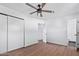 Bedroom with ceiling fan and private bathroom access at 12820 N 29Th Dr, Phoenix, AZ 85029