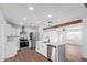 Open concept kitchen with island and stainless steel appliances at 12820 N 29Th Dr, Phoenix, AZ 85029