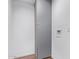 Simple laundry area with built-in shelving at 12820 N 29Th Dr, Phoenix, AZ 85029