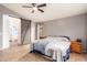 Spacious bedroom with ensuite bathroom access and a barn door at 15206 N 134Th Ln, Surprise, AZ 85379