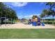 playground with swings and playsets at 1831 N 77Th St, Scottsdale, AZ 85257