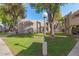 Landscaped grounds with mature trees at 1920 W Lindner Ave # 147, Mesa, AZ 85202