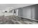 Open concept kitchen with white cabinets and island at 1920 W Lindner Ave # 147, Mesa, AZ 85202