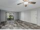 Spacious living room with tile floors and sliding glass door at 1920 W Lindner Ave # 147, Mesa, AZ 85202