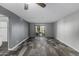 Living room with tile floors, sliding glass doors, and access to patio at 1920 W Lindner Ave # 147, Mesa, AZ 85202
