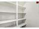 Walk-in pantry with ample shelving for storage at 1920 W Lindner Ave # 147, Mesa, AZ 85202