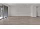 Open living area with tile floors and access to patio at 2518 N Pony Ln, Casa Grande, AZ 85122