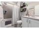 Clean bathroom with shower/tub combo, white vanity, and decorative accents at 26653 W Firehawk Dr, Buckeye, AZ 85396