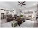 Open living area with kitchen views, neutral decor, and comfortable seating at 26653 W Firehawk Dr, Buckeye, AZ 85396