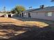 Large backyard with dirt and a shed at 3946 W Cholla St, Phoenix, AZ 85029