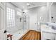 Elegant bathroom with marble shower and double vanity at 41716 N Laurel Valley Way, Anthem, AZ 85086