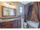 Bathroom with granite countertop and tiled shower/tub at 5681 E Canyon Ridge North Dr, Cave Creek, AZ 85331