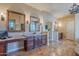 Bathroom boasts double vanities and granite countertops at 5681 E Canyon Ridge North Dr, Cave Creek, AZ 85331