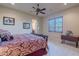 Spacious bedroom with a king-size bed and ceiling fan at 5681 E Canyon Ridge North Dr, Cave Creek, AZ 85331