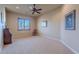 Spacious bedroom with large window and neutral decor at 5681 E Canyon Ridge North Dr, Cave Creek, AZ 85331
