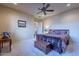 Bright bedroom with a king-size bed and ceiling fan at 5681 E Canyon Ridge North Dr, Cave Creek, AZ 85331