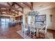Spacious dining room with chandelier and kitchen access at 5681 E Canyon Ridge North Dr, Cave Creek, AZ 85331