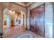 Grand entryway with arched doorways and decorative tile flooring at 5681 E Canyon Ridge North Dr, Cave Creek, AZ 85331