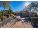 Stunning home exterior with a large courtyard and brick driveway at 5681 E Canyon Ridge North Dr, Cave Creek, AZ 85331