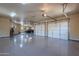 Spacious three-car garage with polished concrete floor at 5681 E Canyon Ridge North Dr, Cave Creek, AZ 85331