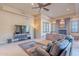 Gathering room with a fireplace and comfortable seating at 5681 E Canyon Ridge North Dr, Cave Creek, AZ 85331
