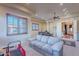 Bright Gathering room with a sofa and views to another room at 5681 E Canyon Ridge North Dr, Cave Creek, AZ 85331