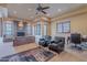 Spacious Gathering room featuring a fireplace and comfortable seating at 5681 E Canyon Ridge North Dr, Cave Creek, AZ 85331