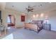 Main bedroom with a large sleigh bed and fireplace at 5681 E Canyon Ridge North Dr, Cave Creek, AZ 85331