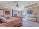 Luxurious main bedroom with a fireplace and sitting area at 5681 E Canyon Ridge North Dr, Cave Creek, AZ 85331