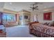 Bright main bedroom with sitting area and large windows at 5681 E Canyon Ridge North Dr, Cave Creek, AZ 85331