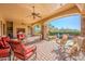 Outdoor patio with built-in grill and access to the pool area at 5681 E Canyon Ridge North Dr, Cave Creek, AZ 85331