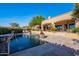 Resort-style pool with fountain and spacious patio at 5681 E Canyon Ridge North Dr, Cave Creek, AZ 85331