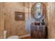 Elegant powder room with ornate vanity and copper sink at 5681 E Canyon Ridge North Dr, Cave Creek, AZ 85331
