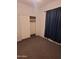 Bedroom with closet and window coverings at 6154 W Echo Ln, Glendale, AZ 85302