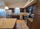 Spacious kitchen featuring granite countertops and stainless steel appliances at 618 W Tumbleweed Rd, Gilbert, AZ 85233