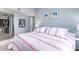 Primary bedroom with a striped comforter and closet at 7000 N Via Camello Del Sur -- # 37, Scottsdale, AZ 85258
