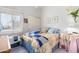 Bedroom with a floral comforter and a side table at 7000 N Via Camello Del Sur -- # 37, Scottsdale, AZ 85258